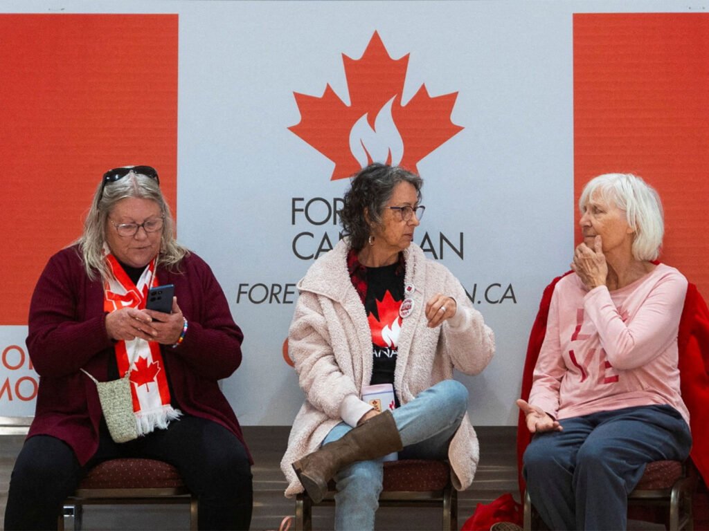 Supporters of the Forever Canadian group, who want Alberta to remain in Canada, sit as they wait for the results (Photo/Reuters)